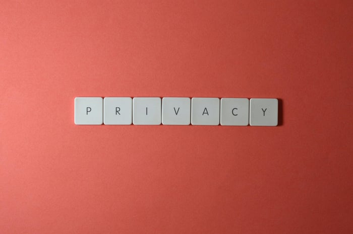 marketing manager analyzing AI citation reports on a dashboard to identify content performance and privacy risks